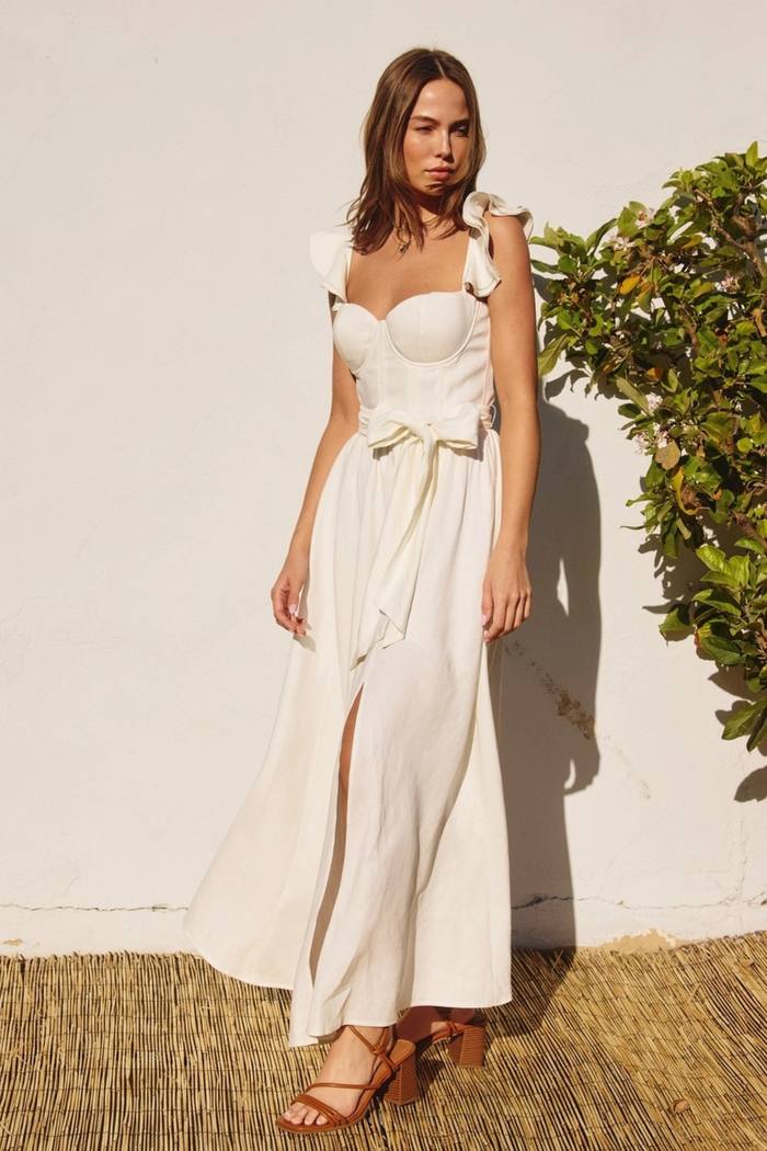 cream corset style maxi dress linen padded cups flutter adjustable shoulder straps side front slit detachable waist tie smocked back panel lined long flowy dress front bow detail
