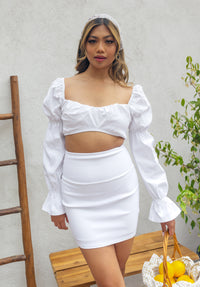 white puff sleeve cropped blouse and high waist mini skirt set women's matching set body-con skirt and cropped top outfit chic summer outfit trendy co-ord set vacation wear stylish fashion attire for warm weather wardrobe women's fashion set perfect for casual outings and beachwear