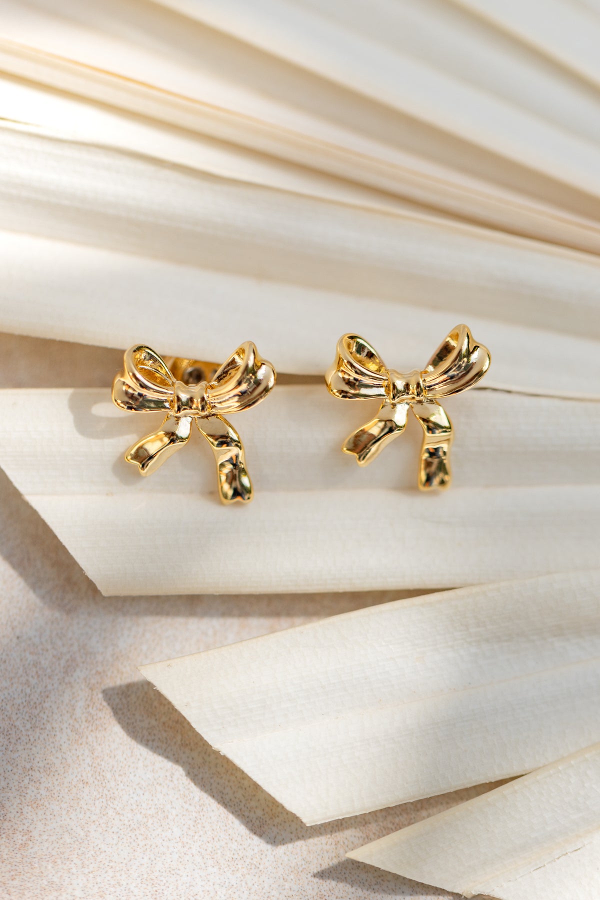 gold bow stud earrings women's jewelry evening wear chic accessory girly