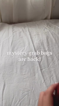 mystery grab bags bundle that contains clothing items and accessories winter season limited edition