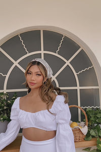 white puff sleeve cropped blouse and high waist mini skirt set women's matching set body-con skirt and cropped top outfit chic summer outfit trendy co-ord set vacation wear stylish fashion attire for warm weather wardrobe women's fashion set perfect for casual outings and beachwear