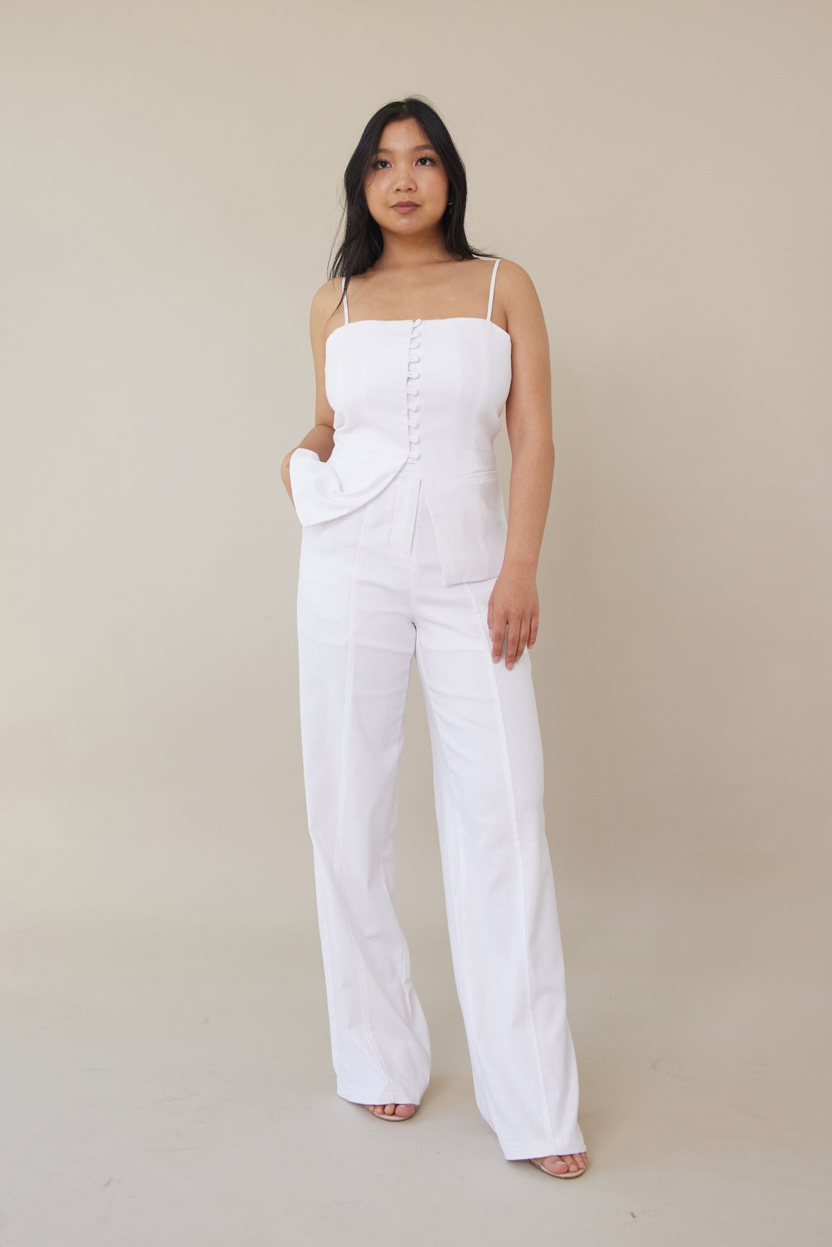 white high waist linen cotton trousers button front zipper closure with three buttons relaxed straight leg cut fit