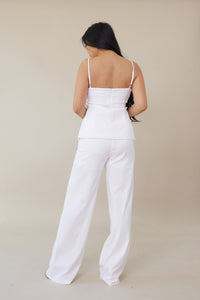 white high waist linen cotton trousers button front zipper closure with three buttons relaxed straight leg cut fit