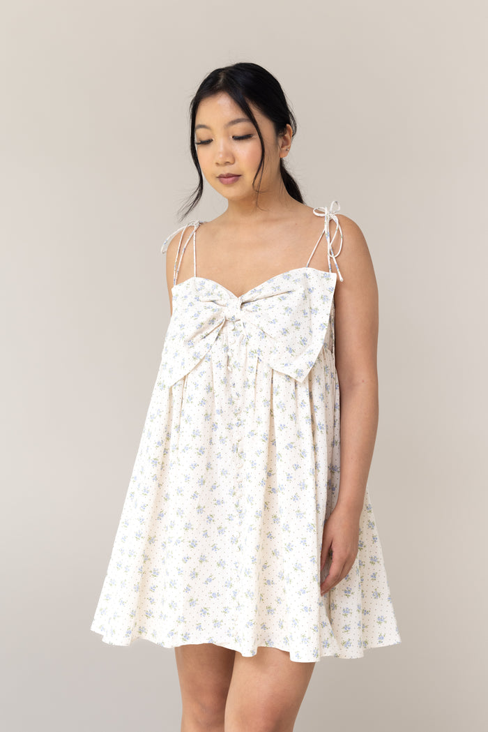 baby doll fit mini dress blue floral flower print big bow front flowy faux button bow tie adjustable straps
