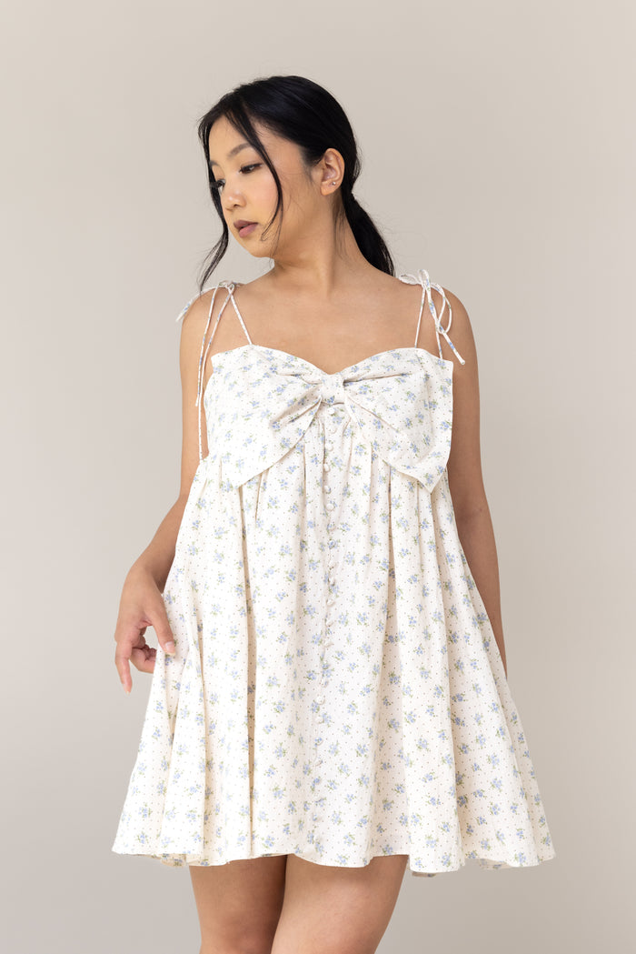 baby doll fit mini dress blue floral flower print big bow front flowy faux button bow tie adjustable straps