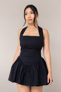 black halter corset fitted mini sexy dress flutter low waist flare out skirt pockets straight neckline sleeveless backless