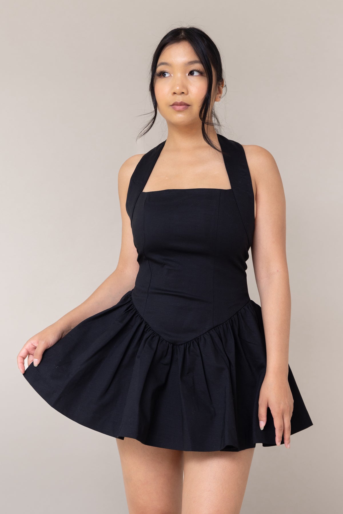 black halter corset fitted mini sexy dress flutter low waist flare out skirt pockets straight neckline sleeveless backless