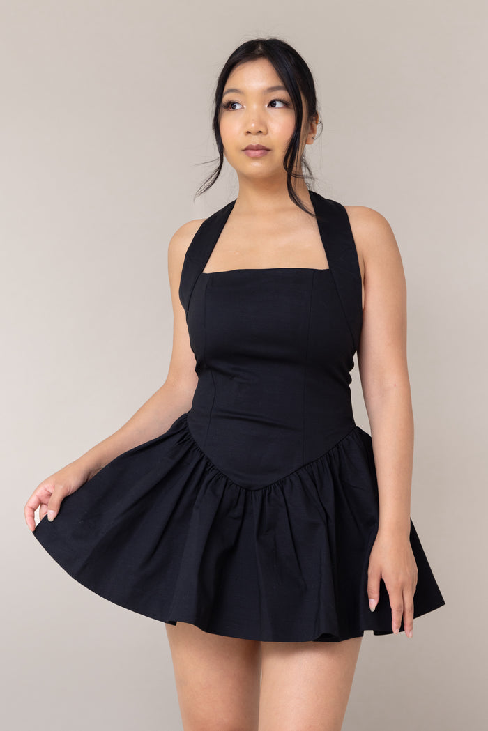 black halter corset fitted mini sexy dress flutter low waist flare out skirt pockets straight neckline sleeveless backless