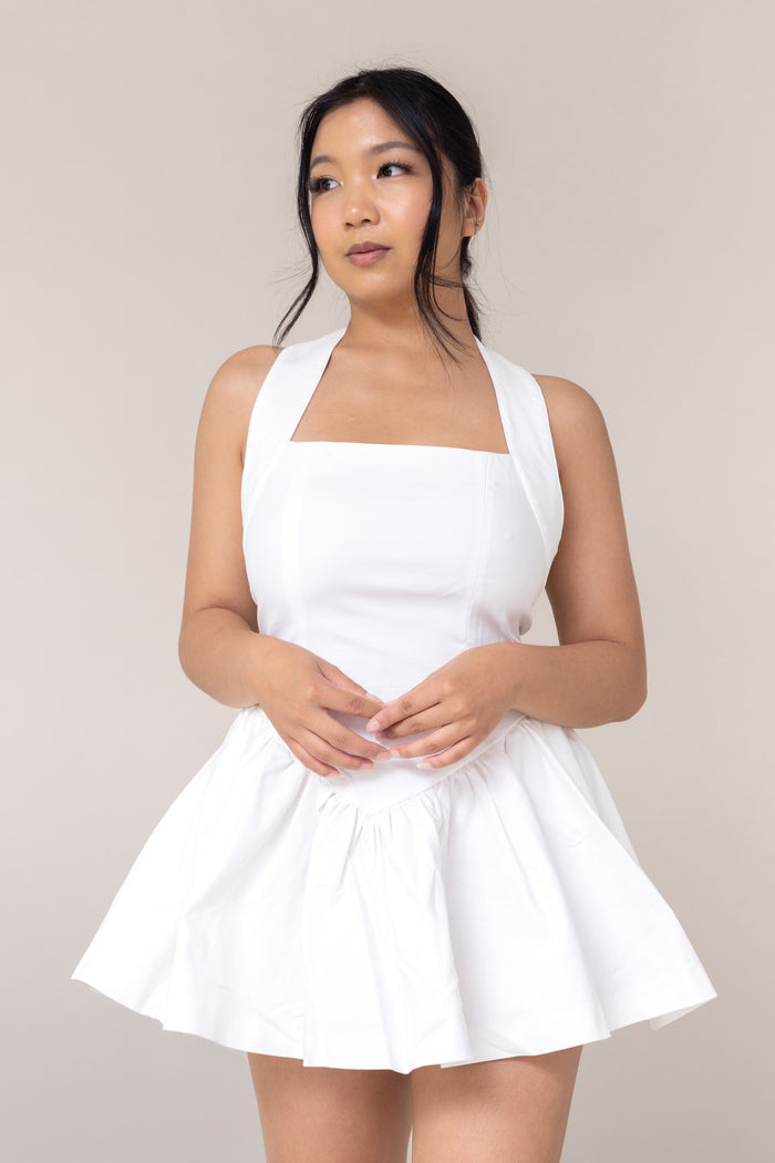 white halter corset fitted mini sexy dress flutter low waist flare out skirt pockets straight neckline sleeveless backless