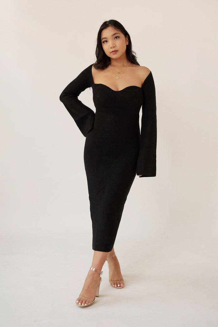 black ribbed midi dress body hugging flare hem bell sleeves wide neckline sweetheart design high slit thick material warm women's fashion elegant chic evening wear trendy