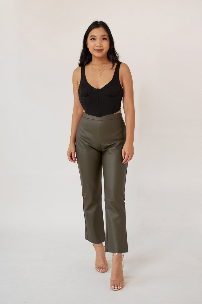 vegan leather pants high rise flare silhouette front slit detail women's fashion trendy stylish bottoms casual chic wear modern wardrobe essential