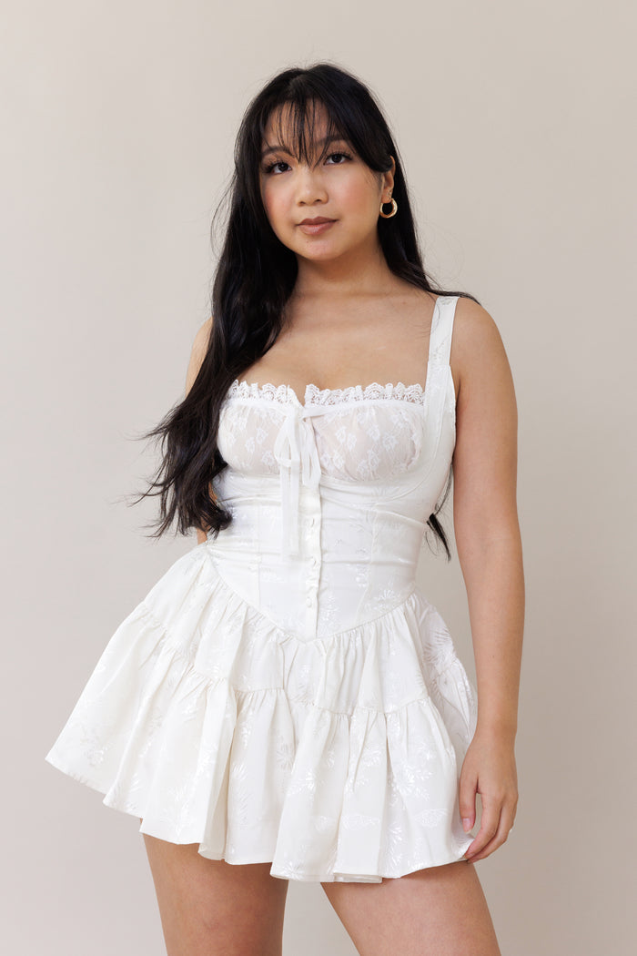 white satin floral mini romper dress square neckline adjustable ruched bust lace trim ruffle smocked back fit casual outfit date night fashion