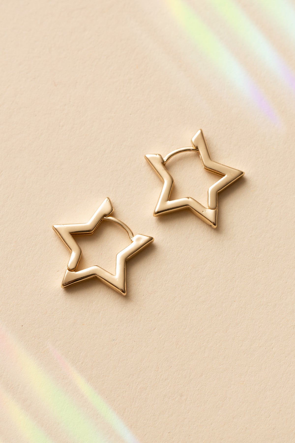 gold star shaped huggie earrings women's jewelry fashion accessories star design everyday wear minimalistic