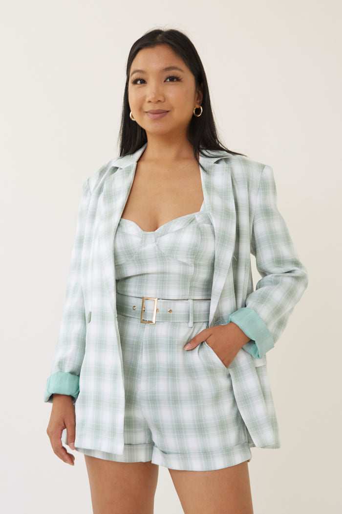 blue plaid high waist shorts with belt fitted crop top bustier corset style sleeveless zip up closure plaid blazer jacket with lapel collar three piece matching outfit