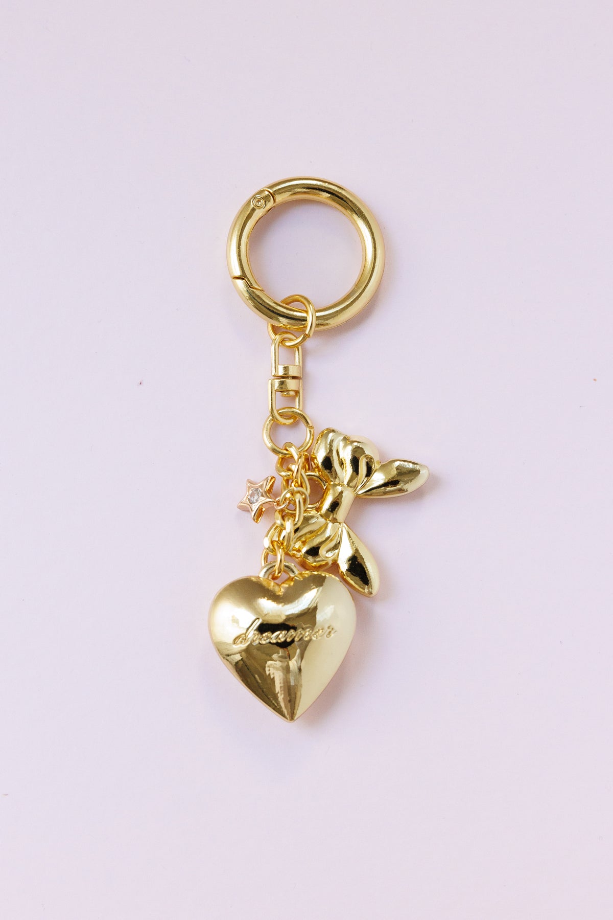 gold dainty heart bag charm engraved dreamer script gold bow star detail key ring accessory for handbags stylish fashion bag charm