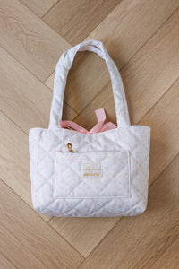 white tote bag with watercolor castle and rose pattern quilted pink bow pink lining long shoulder straps stylish accessory girly style