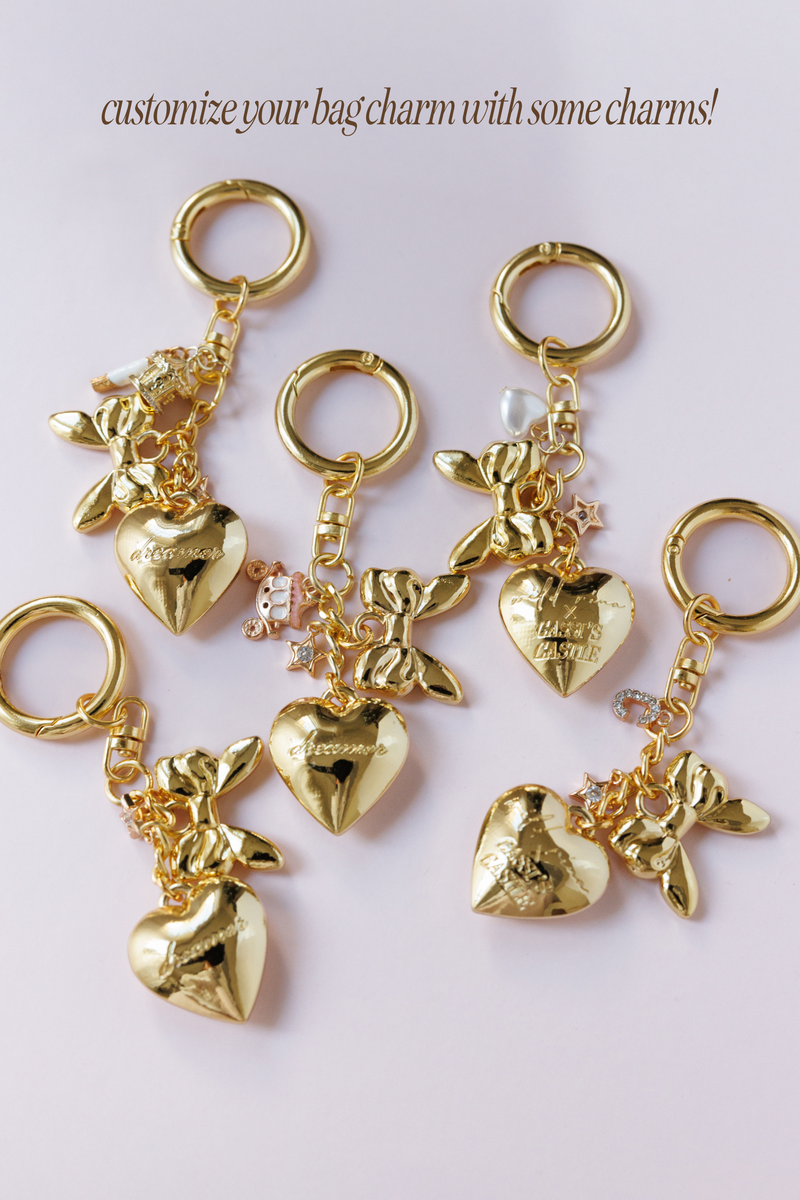 gold dainty heart bag charm engraved dreamer script gold bow star detail key ring accessory for handbags stylish fashion bag charm