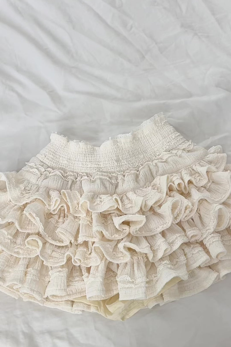 cream multi-layer ruffled mini skort textured knit high waist