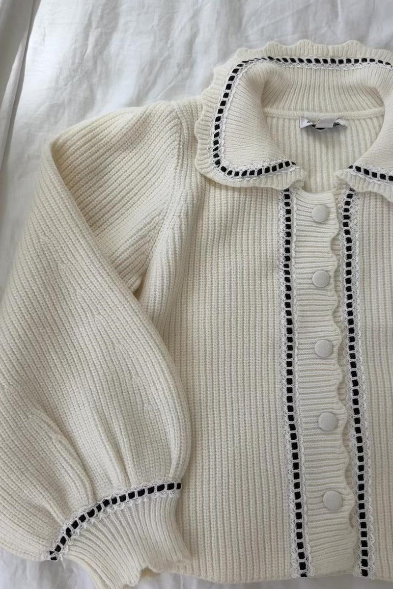 cream cardigan ribbed knit long balloon sleeves cuff button-front placket collared sweater lace black ribbon