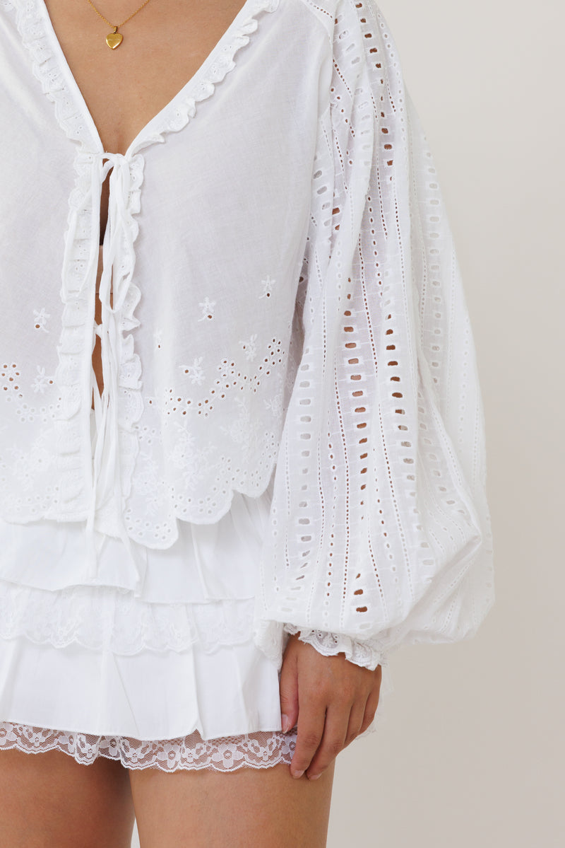 white eyelet embroidered blouse long sleeve v neck top lightweight feminine clothing for spring fall casual outfits