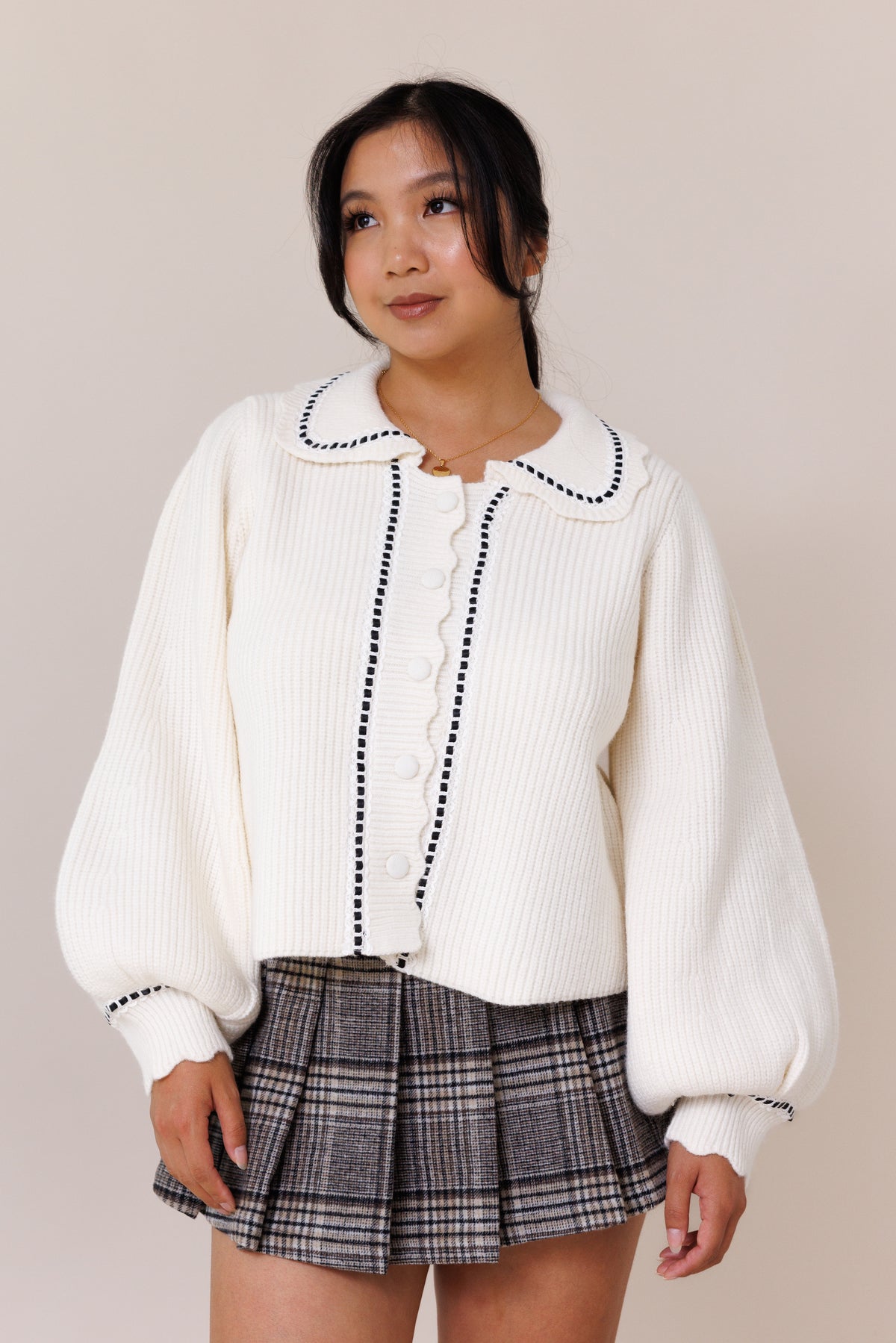 cream cardigan ribbed knit long balloon sleeves cuff button-front placket collared sweater lace black ribbon