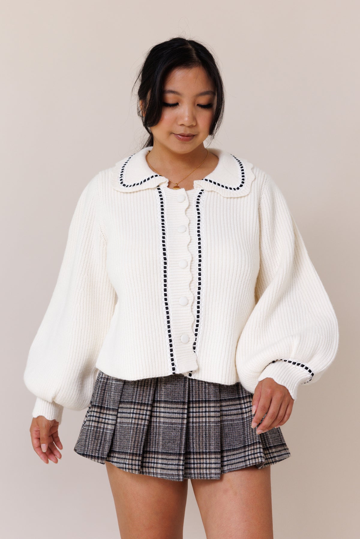 cream cardigan ribbed knit long balloon sleeves cuff button-front placket collared sweater lace black ribbon