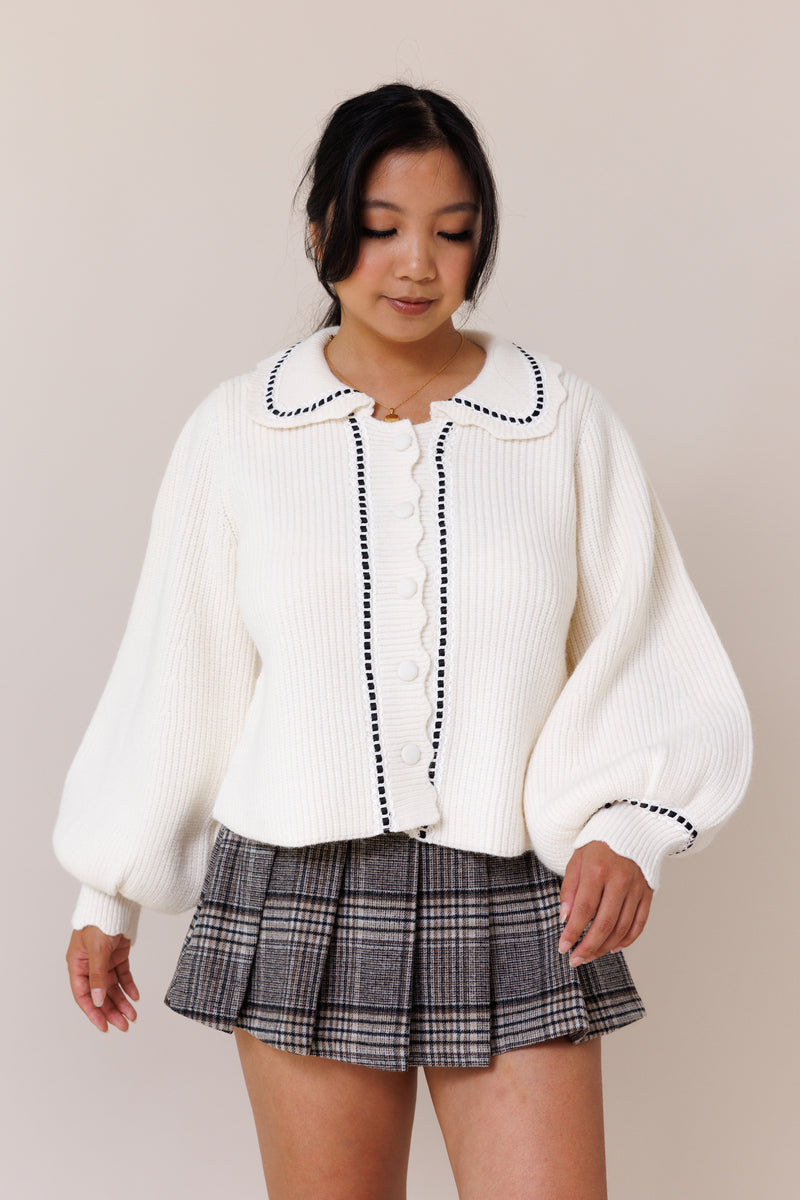 cream cardigan ribbed knit long balloon sleeves cuff button-front placket collared sweater lace black ribbon