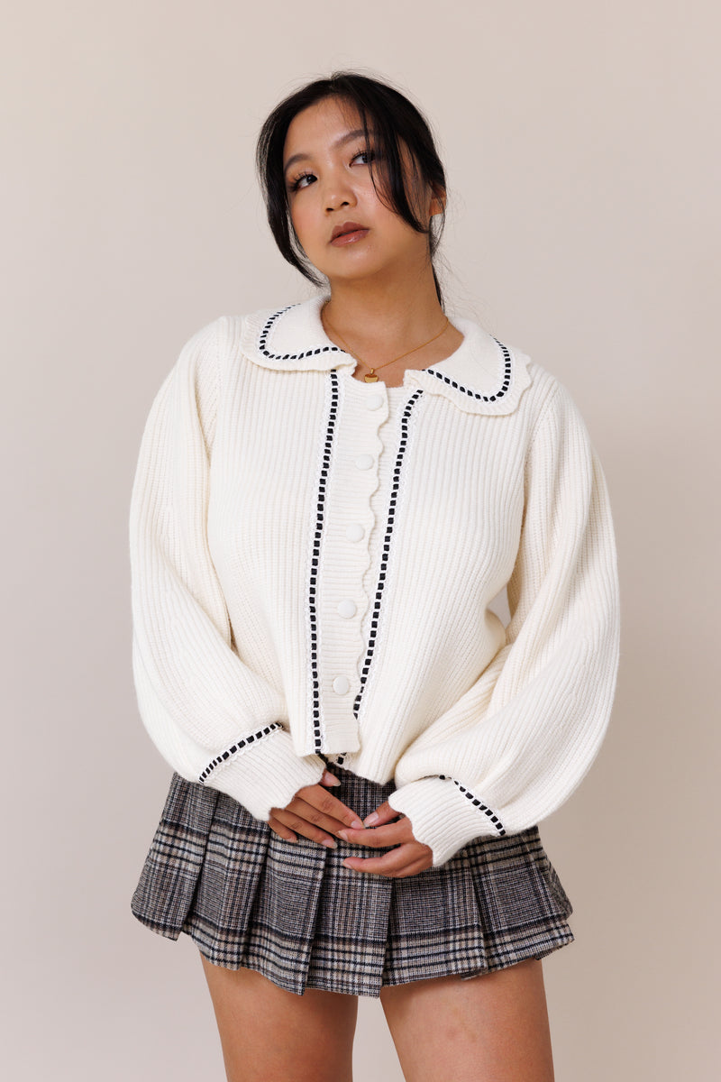 cream cardigan ribbed knit long balloon sleeves cuff button-front placket collared sweater lace black ribbon