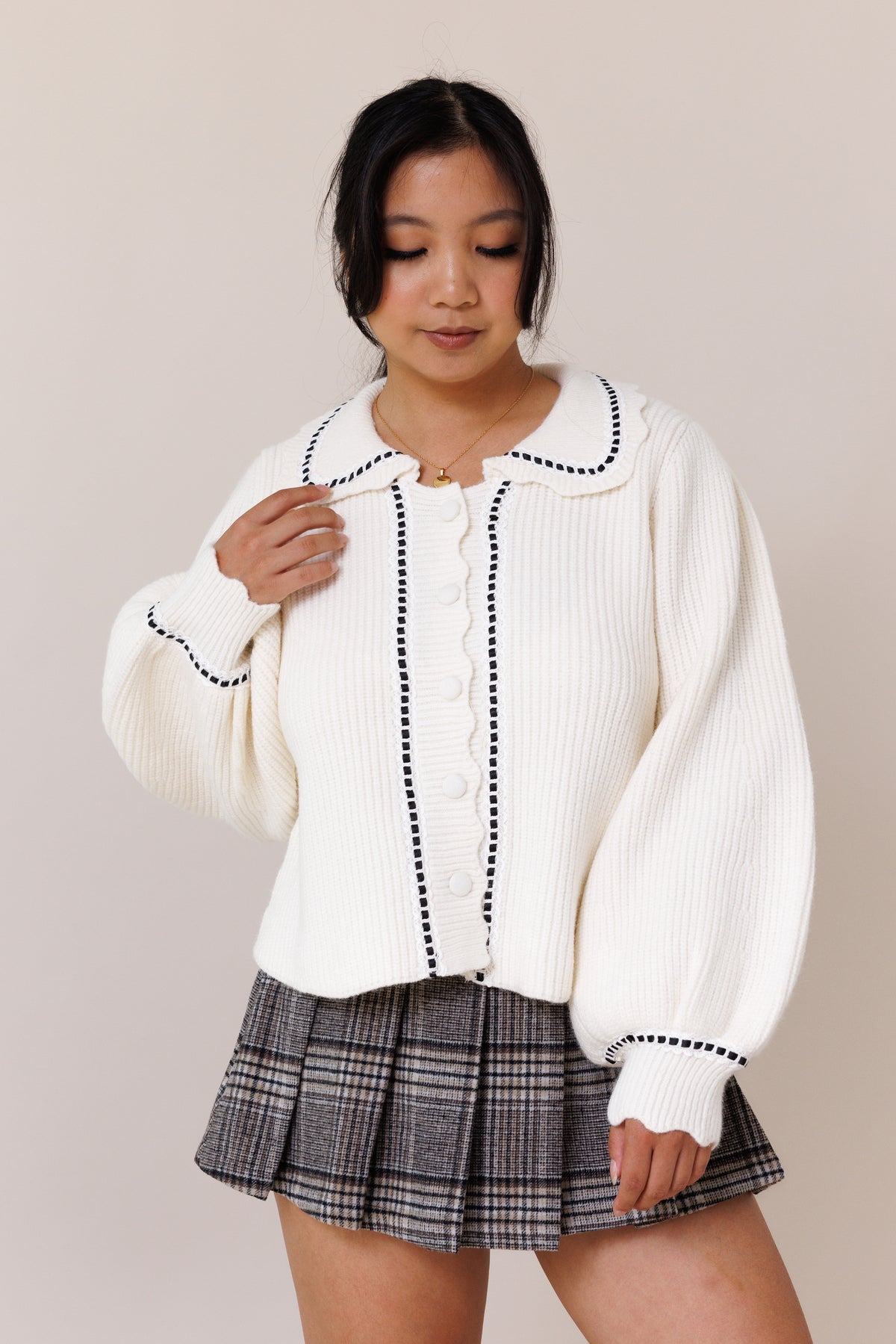 cream cardigan ribbed knit long balloon sleeves cuff button-front placket collared sweater lace black ribbon