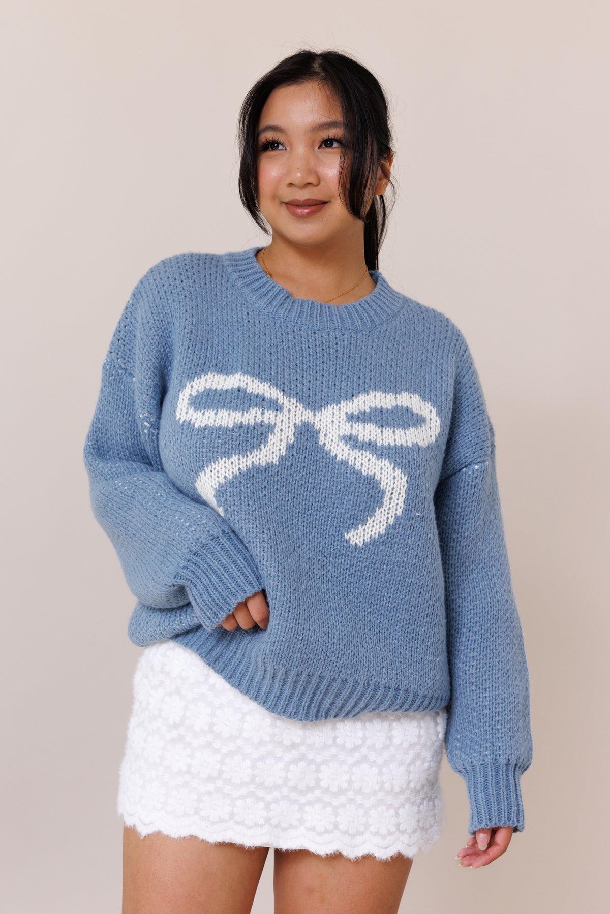 blue pullover knit sweater big bow balloon long sleeves comfy ribbed crew neckline oversized cuffed