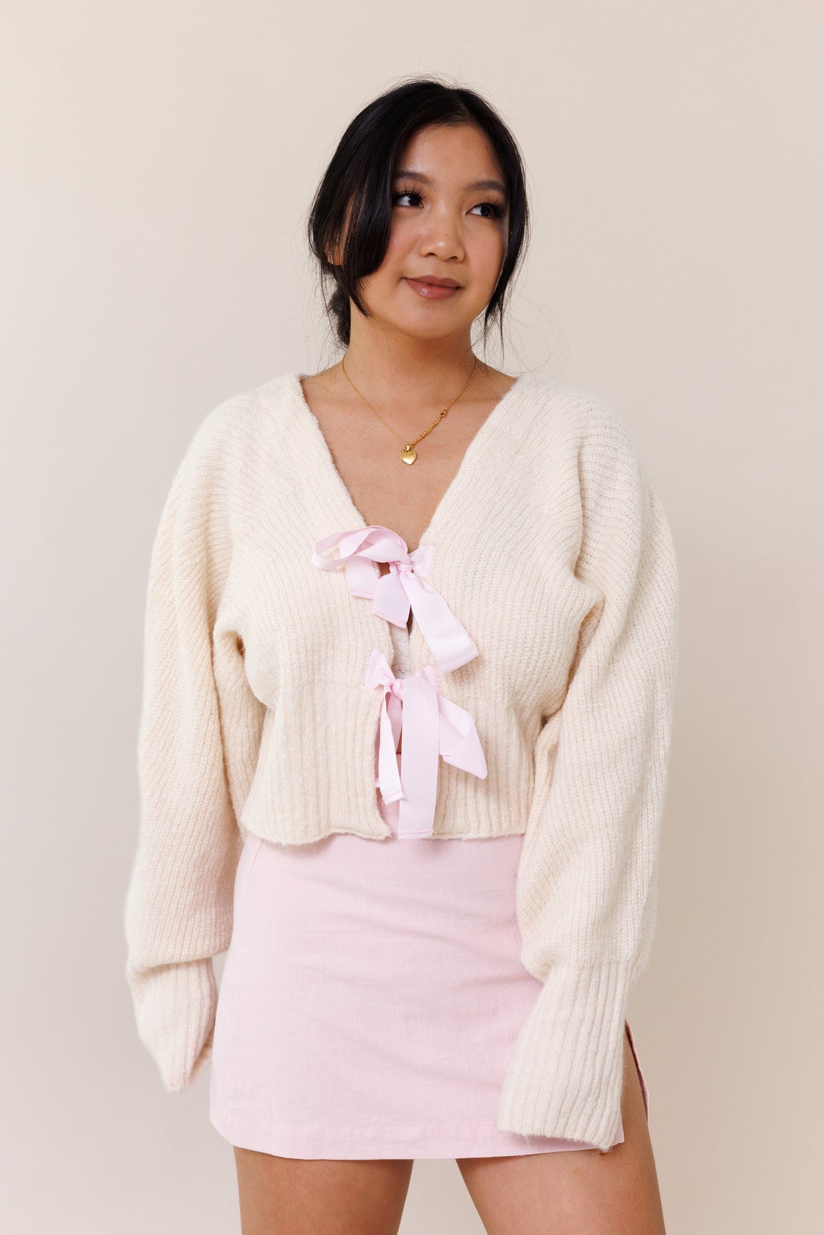 cream knit cardigan sweater dolman long sleeve cuff pink ribbon bow tie closure stretchy v neckline