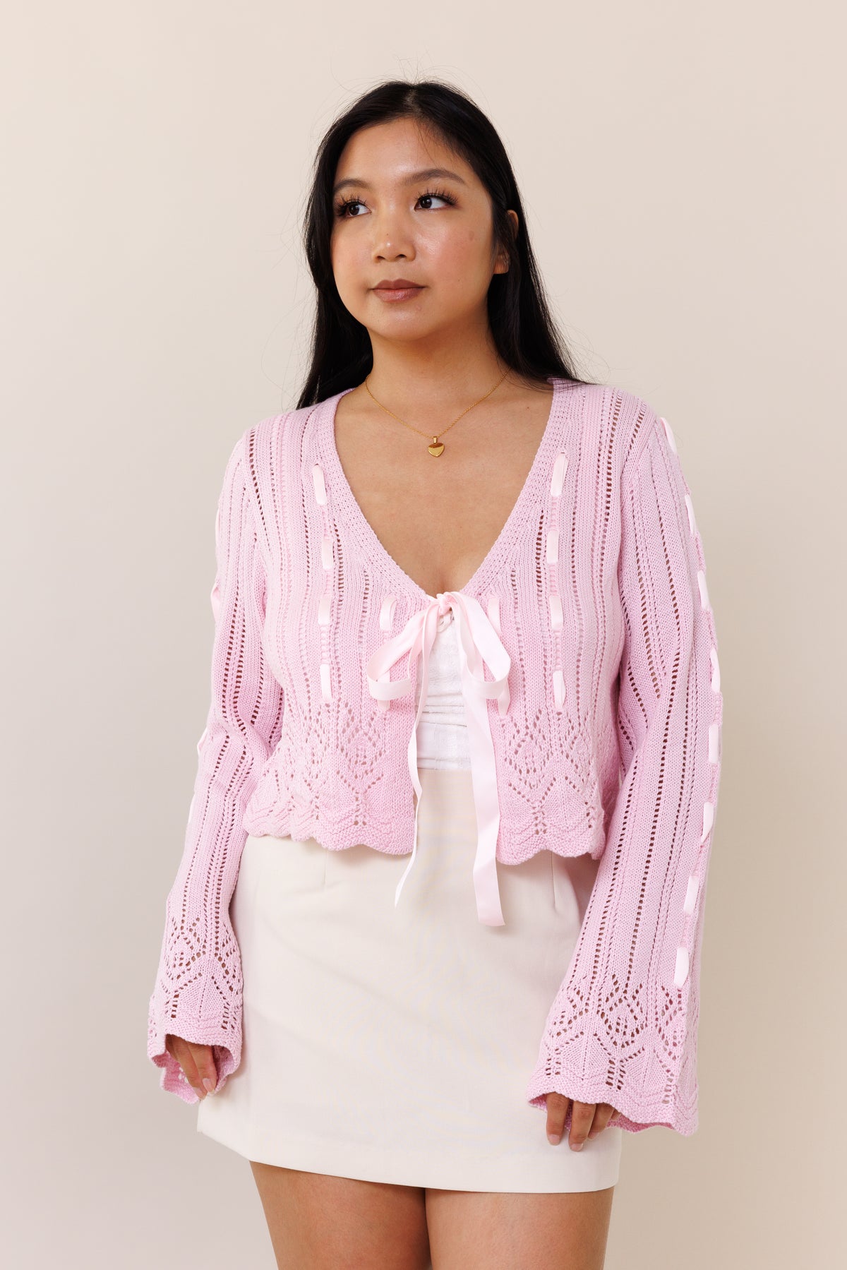 pink knit cardigan laced long bell sleeves open front pink ribbon bow tie