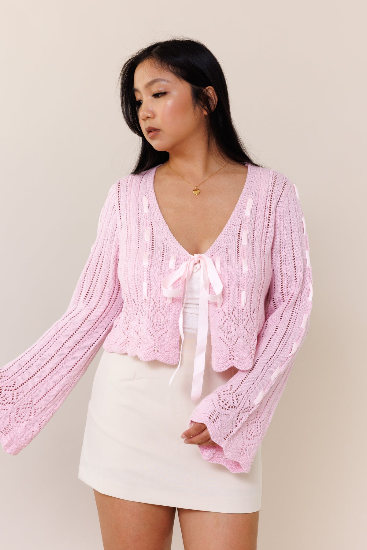 pink knit cardigan laced long bell sleeves open front pink ribbon bow tie