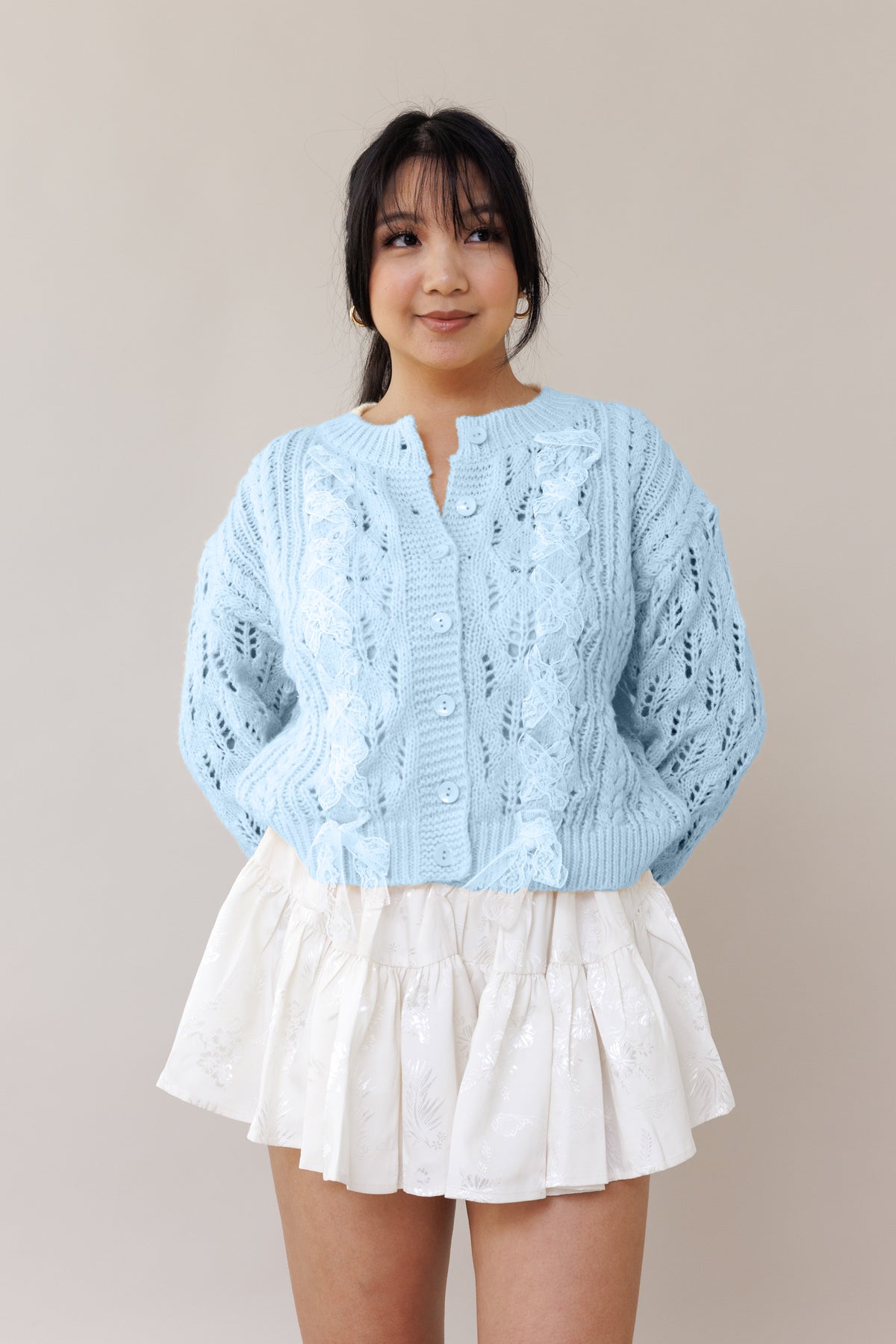 light blue cable knit pullover long sleeve cardigan round neckline ribbed cuffs lace trim bow romantic fashion cozy wear casual outfit fall winter spring style