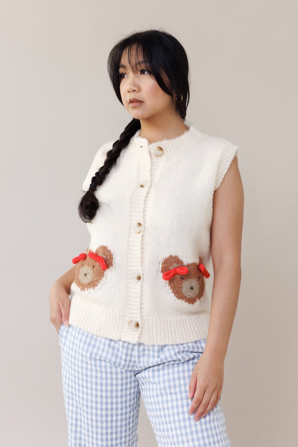 cream cozy knit sweater vest sleeveless oversized fit teddy bear design 3d bow casual wear layering piece cute outfit fall winter spring fashion