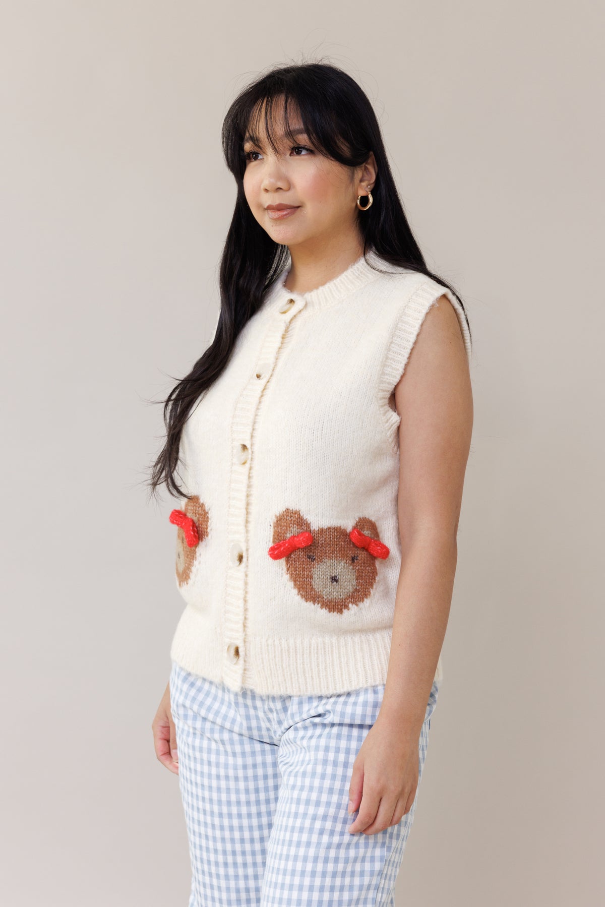 cream cozy knit sweater vest sleeveless oversized fit teddy bear design 3d bow casual wear layering piece cute outfit fall winter spring fashion