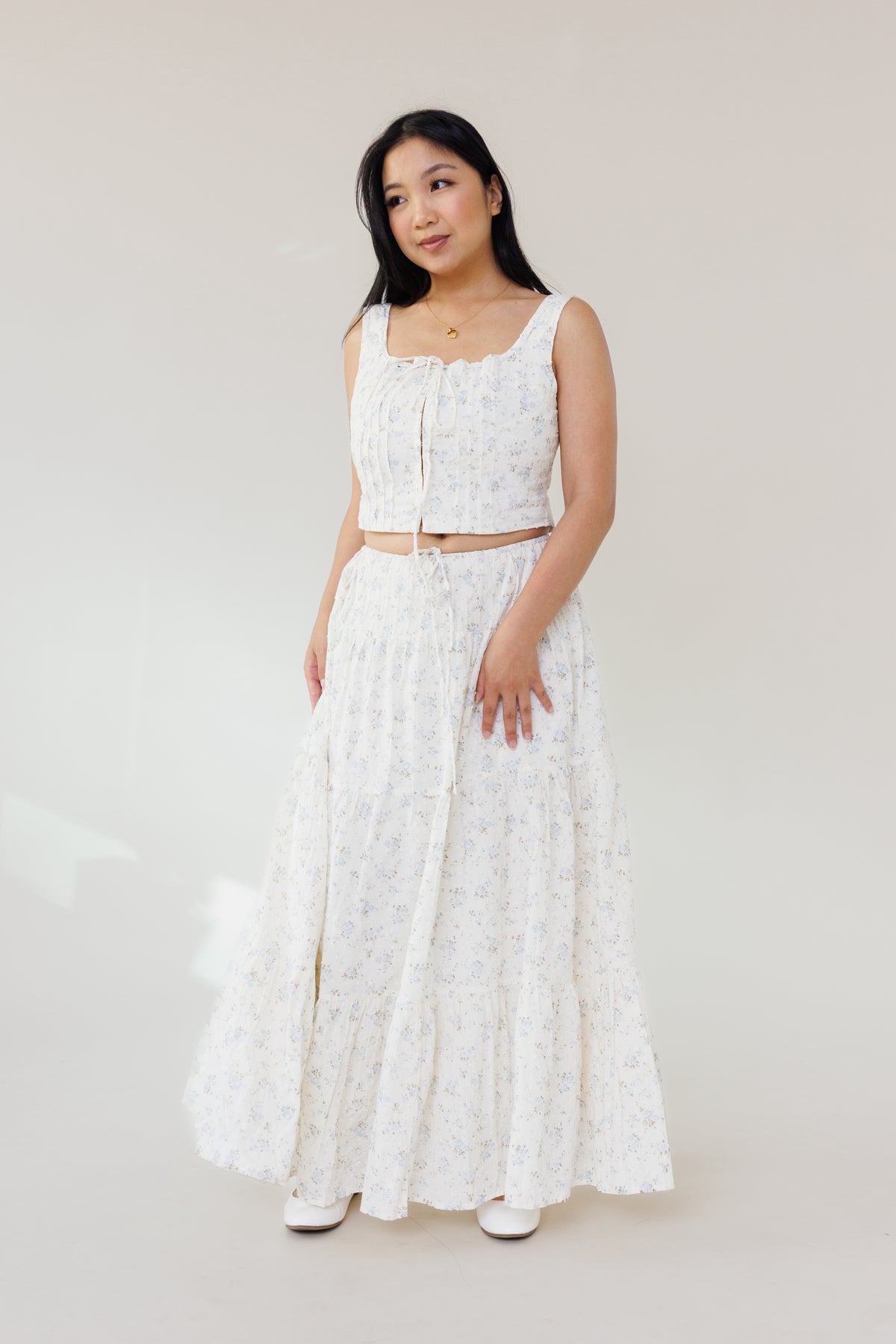 blue floral swiss dot two piece set with corset top hook eye closure and tiered maxi skirt womens fashion for summer outfits vacation wear and garden parties