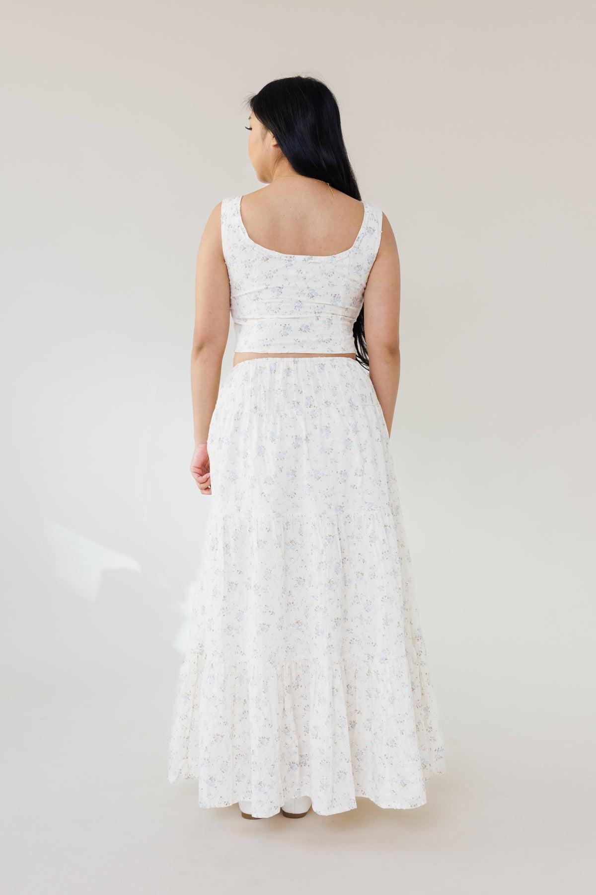 blue floral swiss dot two piece set with corset top hook eye closure and tiered maxi skirt womens fashion for summer outfits vacation wear and garden parties
